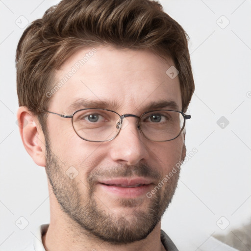 Joyful white adult male with short  brown hair and grey eyes