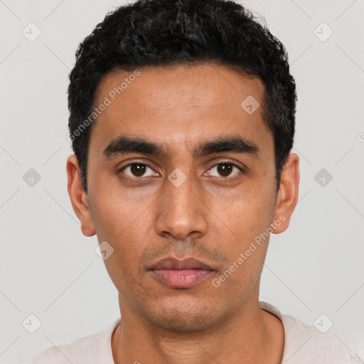 Neutral latino young-adult male with short  black hair and brown eyes