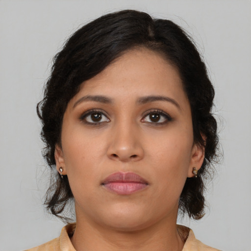 Neutral latino young-adult female with medium  brown hair and brown eyes