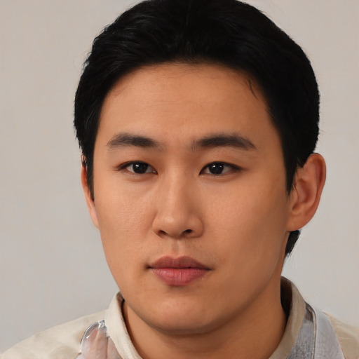 Neutral asian young-adult male with short  black hair and brown eyes