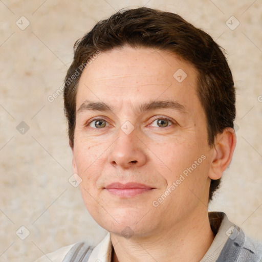 Joyful white adult male with short  brown hair and brown eyes