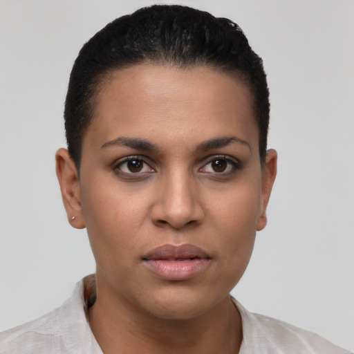 Neutral latino young-adult female with short  brown hair and brown eyes