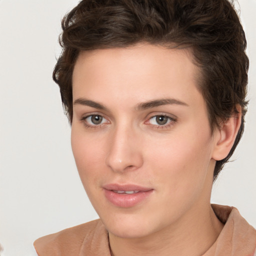 Neutral white young-adult female with short  brown hair and brown eyes