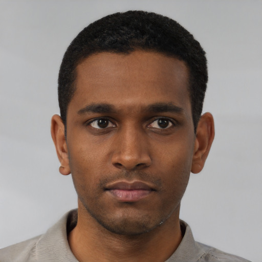 Neutral black young-adult male with short  black hair and brown eyes