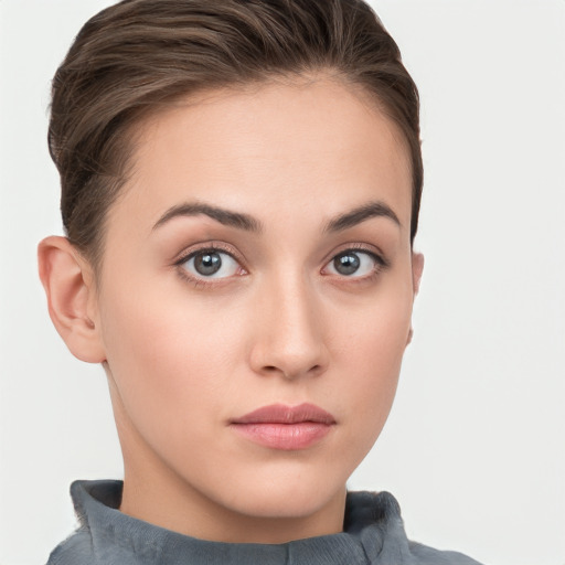 Neutral white young-adult female with short  brown hair and brown eyes