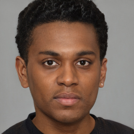 Neutral black young-adult male with short  brown hair and brown eyes