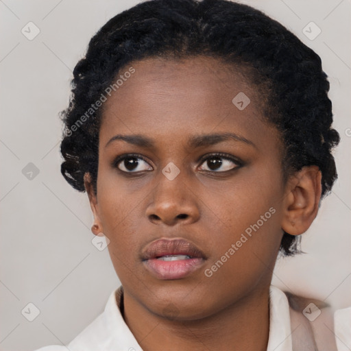 Neutral black young-adult female with short  black hair and brown eyes