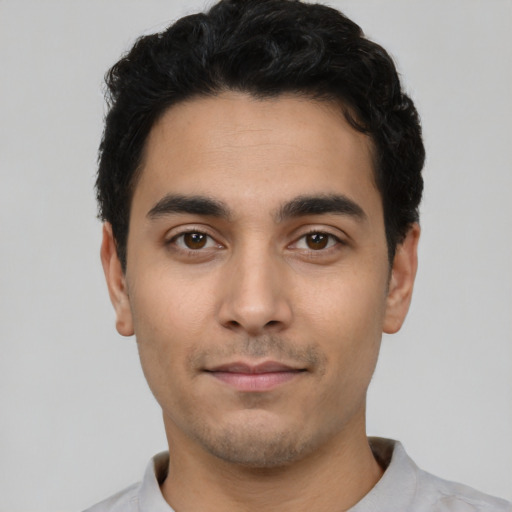 Neutral white young-adult male with short  black hair and brown eyes