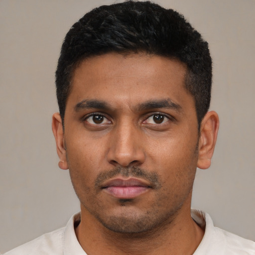 Neutral latino young-adult male with short  black hair and brown eyes