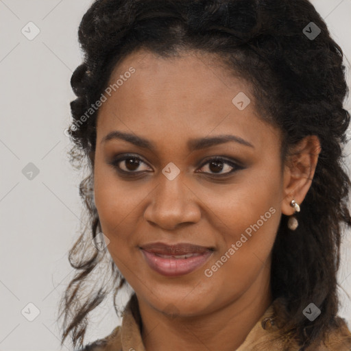 Joyful black young-adult female with long  brown hair and brown eyes