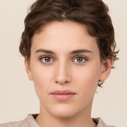 Neutral white young-adult female with short  brown hair and brown eyes