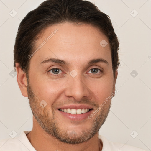 Joyful white young-adult male with short  brown hair and brown eyes