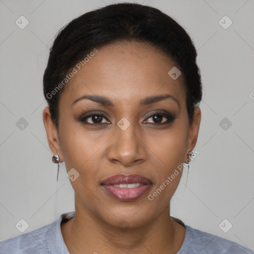 Joyful black young-adult female with short  brown hair and brown eyes