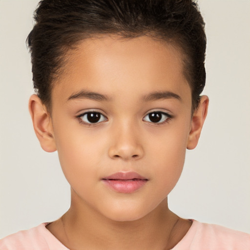 Joyful white child female with short  brown hair and brown eyes