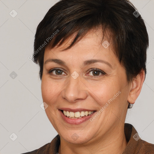 Joyful white adult female with medium  brown hair and brown eyes