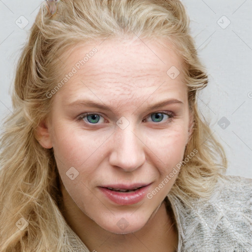 Joyful white young-adult female with long  brown hair and blue eyes