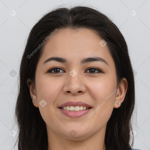 Joyful latino young-adult female with long  brown hair and brown eyes