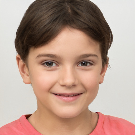 Joyful white child female with short  brown hair and brown eyes