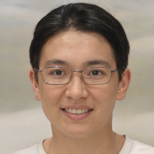 Joyful white adult female with short  brown hair and brown eyes