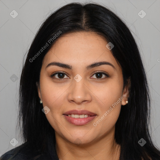 Joyful latino young-adult female with long  black hair and brown eyes