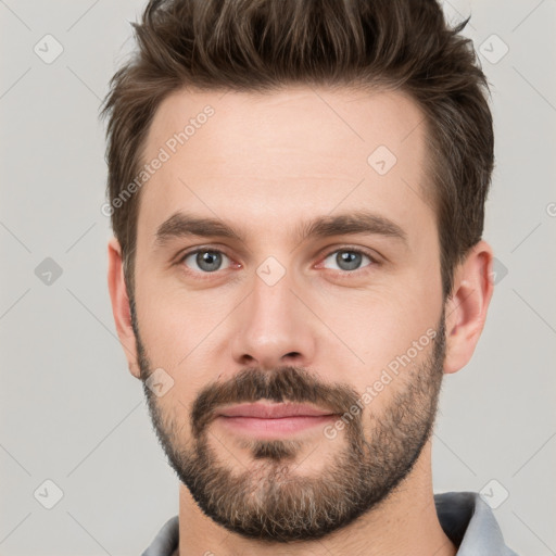 Neutral white young-adult male with short  brown hair and brown eyes