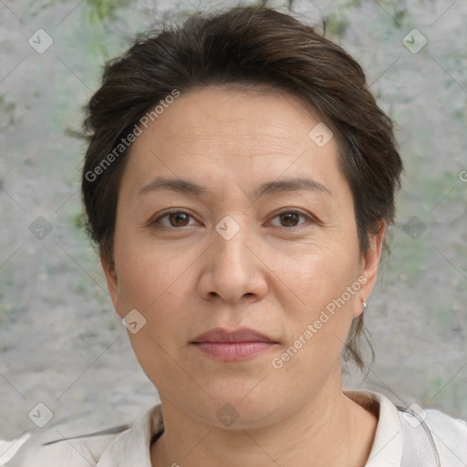 Joyful white adult female with short  brown hair and brown eyes