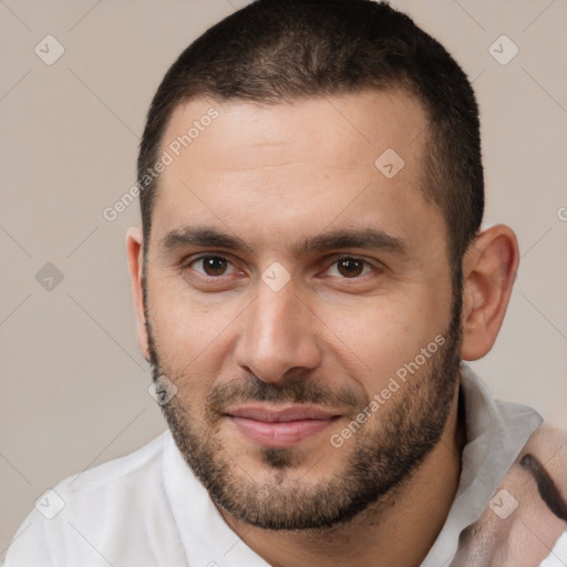 Joyful white young-adult male with short  brown hair and brown eyes