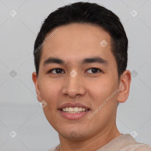 Joyful white young-adult male with short  black hair and brown eyes