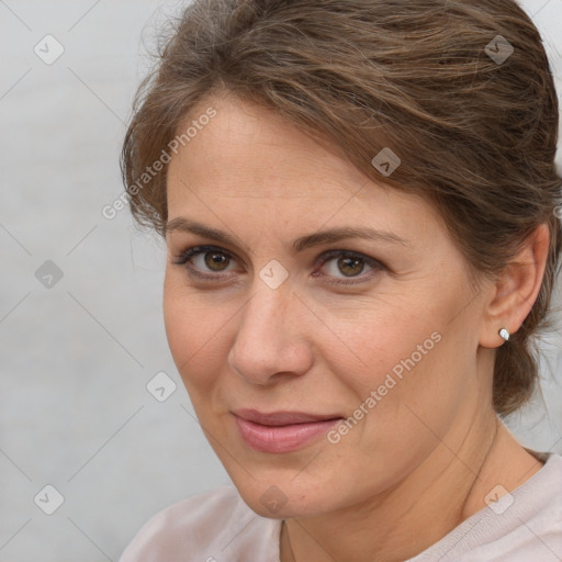 Joyful white adult female with short  brown hair and brown eyes