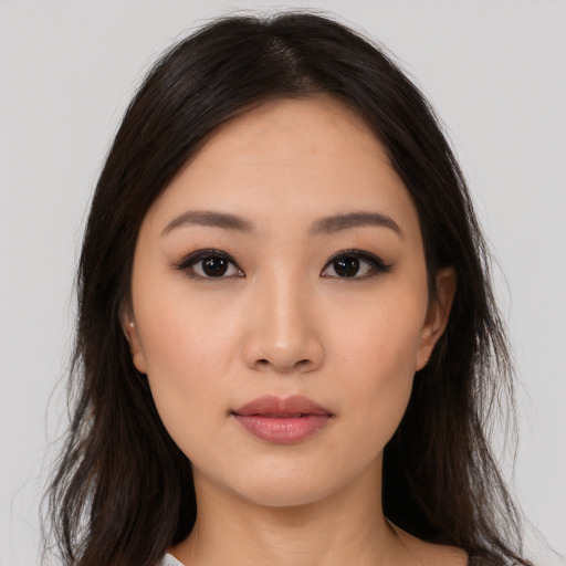 Neutral asian young-adult female with long  brown hair and brown eyes