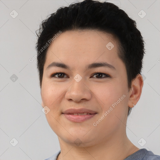 Joyful white young-adult female with short  black hair and brown eyes