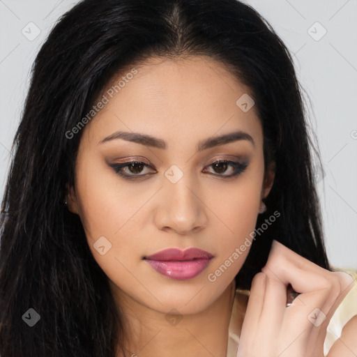 Joyful latino young-adult female with long  brown hair and brown eyes