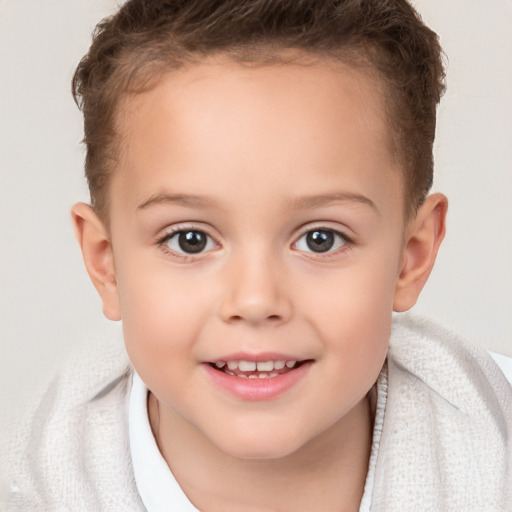 Joyful white child female with short  brown hair and brown eyes