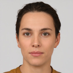 Neutral white young-adult female with short  brown hair and brown eyes