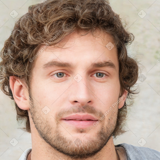 Neutral white young-adult male with short  brown hair and grey eyes