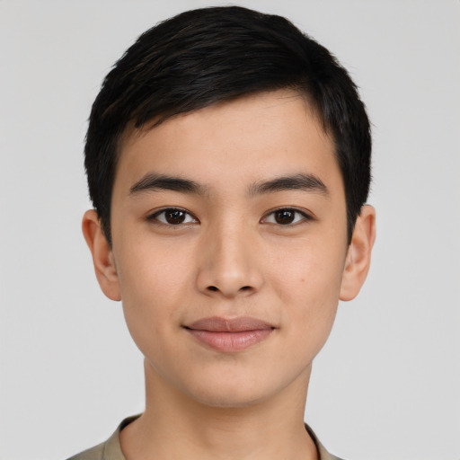 Joyful asian young-adult male with short  black hair and brown eyes