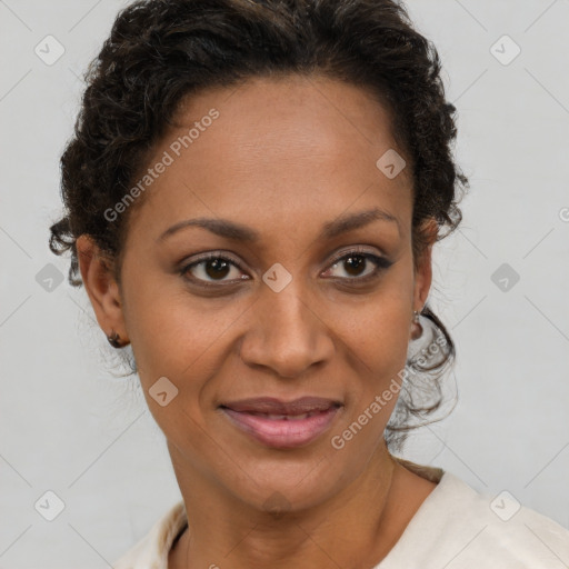 Joyful black adult female with short  brown hair and brown eyes