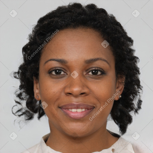 Joyful black young-adult female with medium  black hair and brown eyes