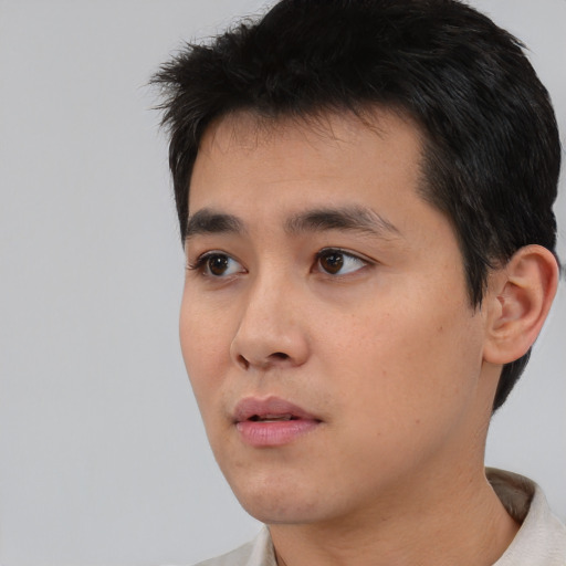 Neutral asian young-adult male with short  black hair and brown eyes