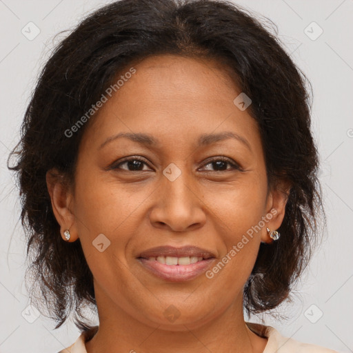 Joyful white adult female with medium  brown hair and brown eyes