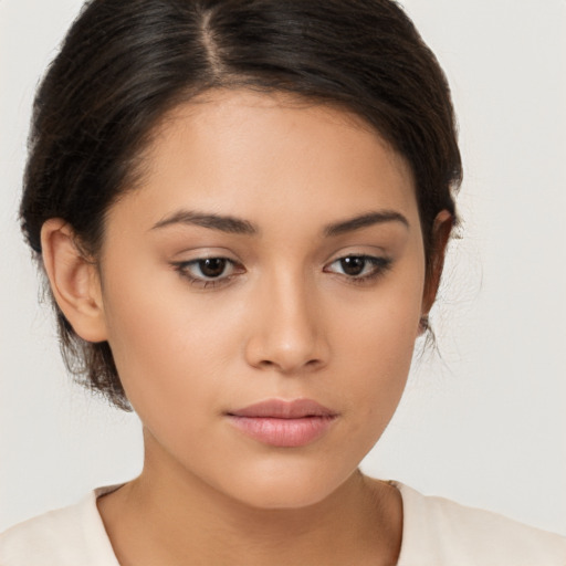 Neutral latino young-adult female with medium  brown hair and brown eyes