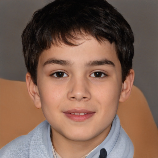 Joyful white child male with short  brown hair and brown eyes