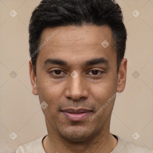 Joyful latino young-adult male with short  black hair and brown eyes