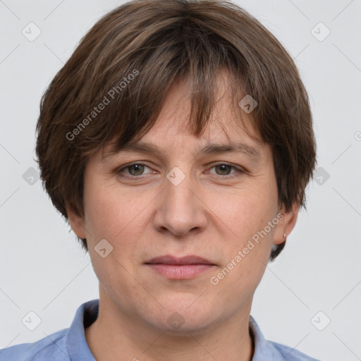 Joyful white adult male with short  brown hair and grey eyes