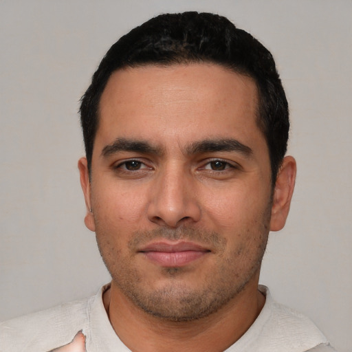 Neutral white young-adult male with short  black hair and brown eyes