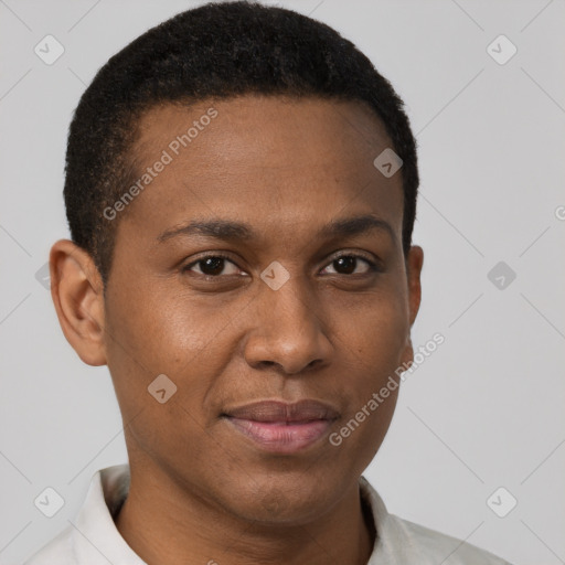 Joyful black young-adult male with short  brown hair and brown eyes