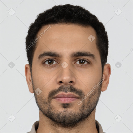 Neutral latino young-adult male with short  black hair and brown eyes