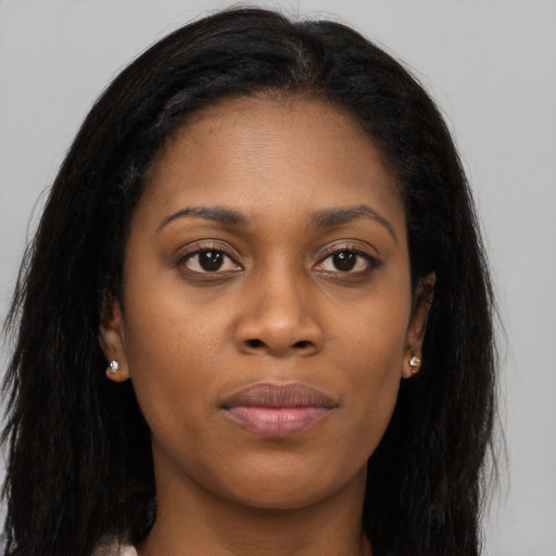 Joyful asian young-adult female with long  brown hair and brown eyes