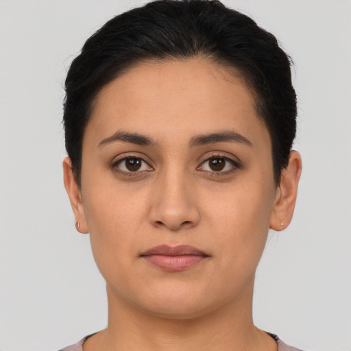 Neutral latino young-adult female with short  black hair and brown eyes