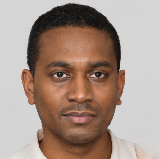 Neutral black young-adult male with short  black hair and brown eyes